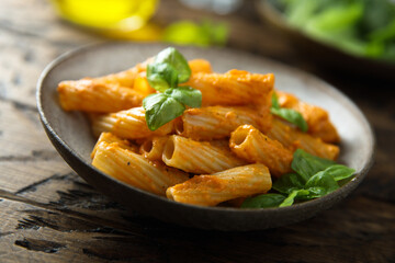 Pasta with red pesto and cheese
