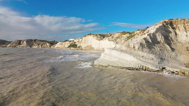 Aerial drone viewpoint on Stair of the Turks. Scala dei Turchi is a rocky cliff on the southern coast of Sicily, Italy