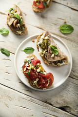 Bruschetta with meat and cream cheese