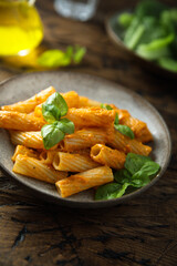 Pasta with red pesto and cheese