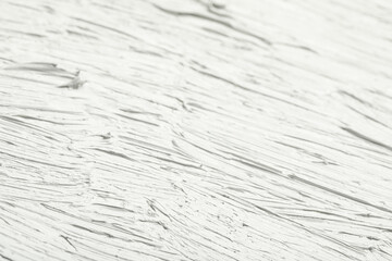 Texture of white oil paint as background, closeup