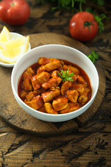 Traditional homemade chicken ragout with tomato sauce