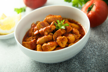 Traditional homemade chicken ragout with tomato sauce