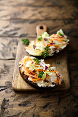 Homemade toast with cream cheese and vegetables