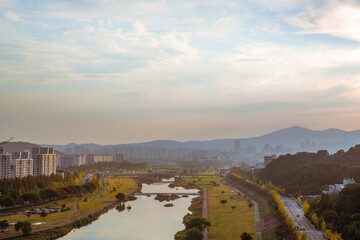 Fototapeta na wymiar Panoramic view of Yuseong district skyscraper and riverside park in Daejeon, Korea