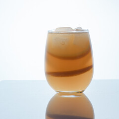 
orange drink with ice. cooling drink with orange.