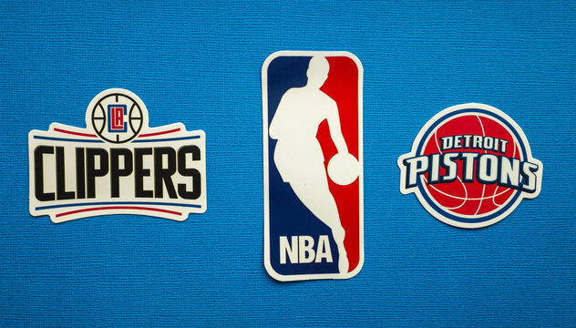 October 1, 2021, Springfield, USA, Emblems Of The Los Angeles Clippers And Detroit Pistons Basketball Teams On A Blue Background.