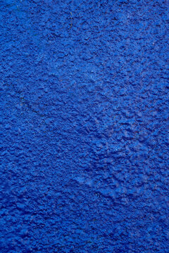 Abstract contemporary texture background. Blue old dirty wall. 