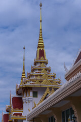 Fototapeta premium Buddhist temple Was on Sukhumvitt Rd BKK Bangkok Thailand, vivid lush colours if the buildings are glorious