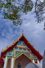Buddhist temple Was on Sukhumvitt Rd BKK Bangkok Thailand, vivid lush colours if the buildings are glorious