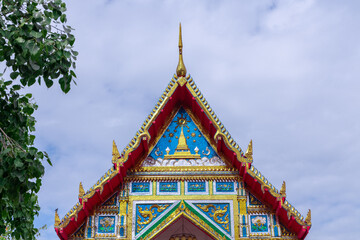 Naklejka premium Buddhist temple Was on Sukhumvitt Rd BKK Bangkok Thailand, vivid lush colours if the buildings are glorious