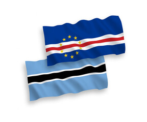 National vector fabric wave flags of Republic of Cabo Verde and Botswana isolated on white background. 1 to 2 proportion.