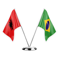 Two table flags isolated on white background 3d illustration, albenia and brazil