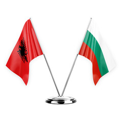 Two table flags isolated on white background 3d illustration, albenia and bulgaria