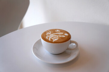 Top view White cup of Cappuccino Latte coffee isolated on white background with clipping path.