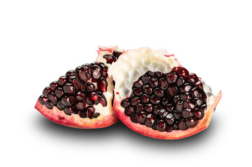 Pieces of dark red pomegranate fruit isolated on white background with clipping path.