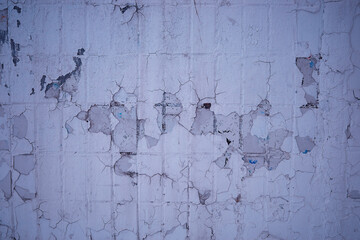 Grunge cracks on street wall texture backdrop