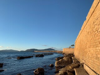 View of seafront bastions in Alghero, Sardinia, Italy