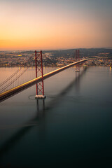 Sunset view over capital of Portugal; Lisbon. The most iconic landmark is the subject of this...