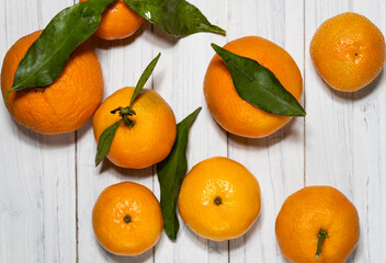 Background with tangerines. advertising background tangerines. Delicious juicy tangerines. Ripe tangerines on the table