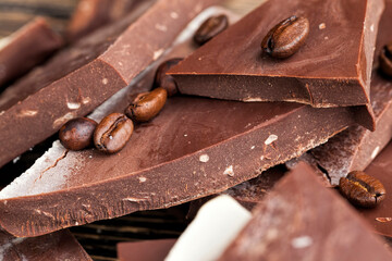 coffee and pieces of milk chocolate from cocoa