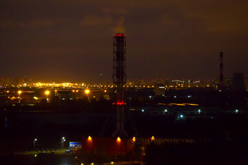 Fototapeta na wymiar high-rise residential building close-up, night photo 