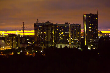 Fototapeta premium high-rise residential building close-up, night photo 