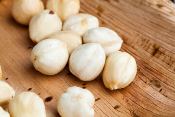 dried hazelnutsnuts on a wooden table
