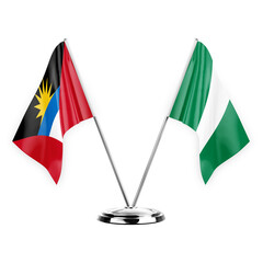 Two table flags isolated on white background 3d illustration, antigua barbuda and nigeria
