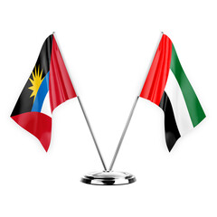 Two table flags isolated on white background 3d illustration, antigua barbuda and united arab emirates