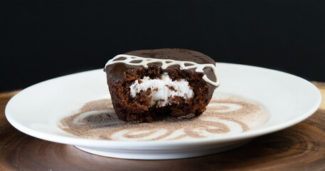 Chocolate Muffin filled with cream