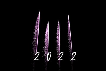 Happy new year 2022 pink fireworks rockets new years eve. Luxury firework event sky show turn of the year celebration. Holidays season party time. Premium entertainment nightlife background