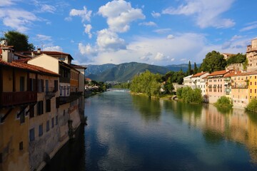 Fototapeta na wymiar View along the Brenta River in Bassano del Grappa, Italy.