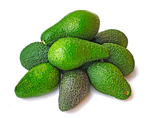 Close up of avocados isolated on white background