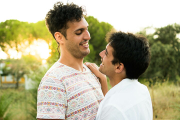 Fototapeta premium Young gay couple of men laughing in love.