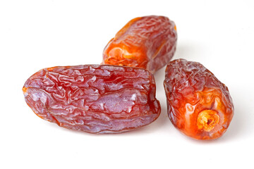 dried dates isolated on white