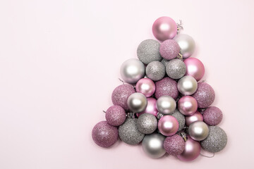 Christmas tree made of pink and silver ornaments 