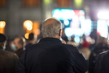 people in street in bokeh background