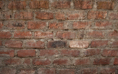 Old brick wall with red brick Background of brick wall texture red stone wall pattern.