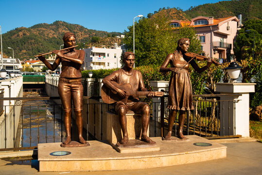 MARMARIS, TURKEY: Monument of musicians. A man plays the guitar, one girl plays the flute, the other the violin.