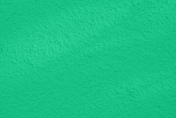 Seamless texture of mint green cement old wall a rough surface, with space for text, for a background..