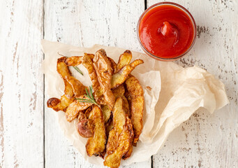 Homemade potato rind chips with spices, top view. Sustainable food.