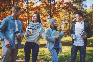 Students in autumn park