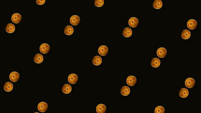 Colorful fruit pattern of fresh rotating grapefruits on black background. Seamless pattern with grapefruit. Realistic animation. 4K video motion