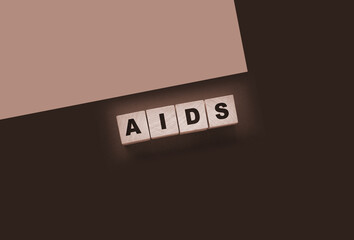 AIDS letters on wooden cubes. STD sexually transmitted diseases