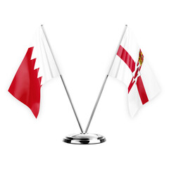 Two table flags isolated on white background 3d illustration, bahrain and ireland