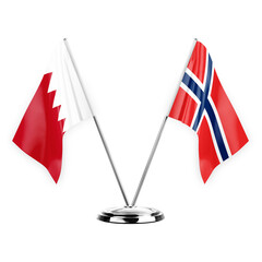 Two table flags isolated on white background 3d illustration, bahrain and norway