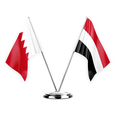 Obraz premium Two table flags isolated on white background 3d illustration, bahrain and yemen