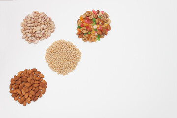 Nuts and snacks, a snack for beer on a white solid background.