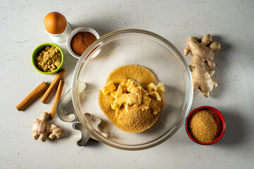 Gingerbread ingredients and accessories for making ginger dough.